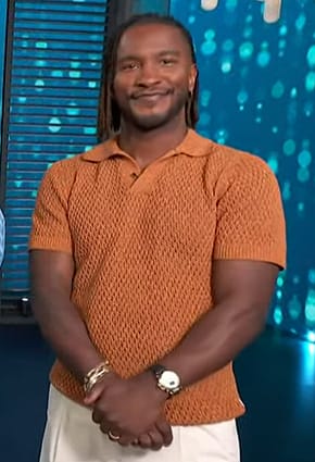 Scott’s orange knit polo on Access Hollywood