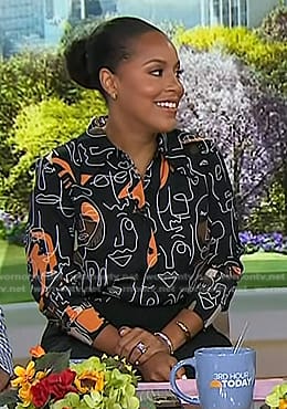 Sheinelle’s black face print blouse on Today