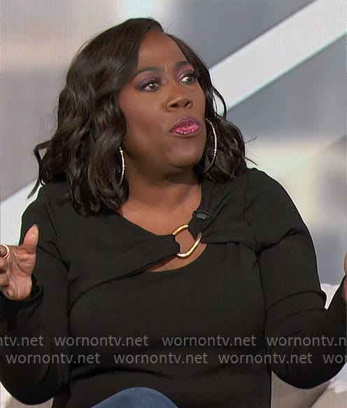 Sheryl's black top with gold ring detail on The Talk