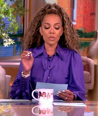 Sunny’s purple puff sleeve blouse on The View