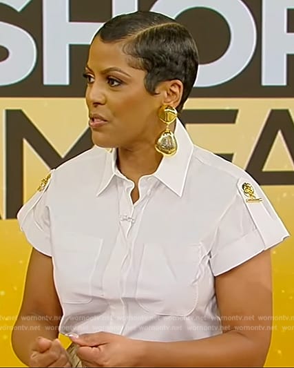 Tamron's white shirt and baggy skirt on Tamron Hall Show