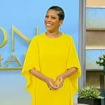 Tamron’s yellow ruffle sleeve dress on Tamron Hall Show