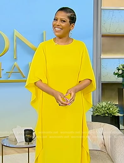 Tamron’s yellow ruffle sleeve dress on Tamron Hall Show