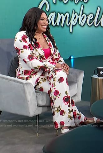 Tisha Campbell’s white floral print suit on Access Hollywood