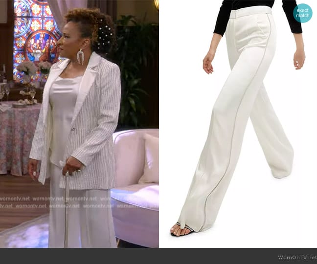 Lucretia’s white metallic stripe pants on The Upshaws