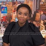 Zinhle's black collared puff sleeve blouse on NBC News Daily