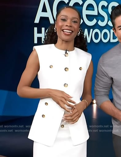 Zuri’s white button vest and mini skirt on Access Hollywood