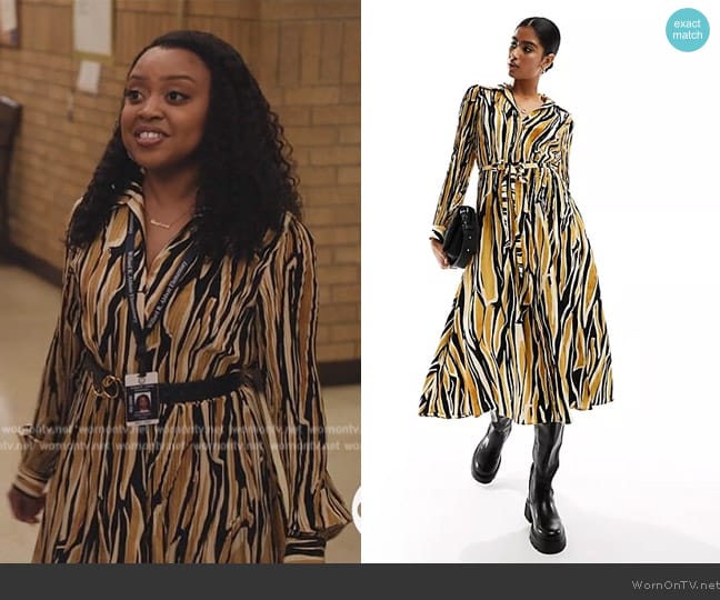 Mango Midi print dress in brown worn by Janine Teagues (Quinta Brunson) on Abbott Elementary