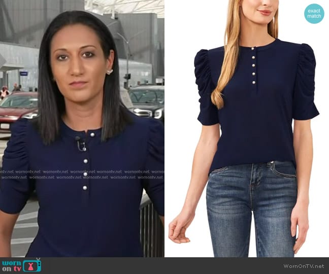 Cece Ruched Puff-Sleeve Henley Knit Top in Navy worn by Priya Sridhar on NBC News Daily