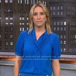 Alex Wilson's blue tie neck top and pants on CBS Evening News