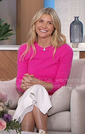 Amanda's pink sweater and white faux leather skirt on The Talk