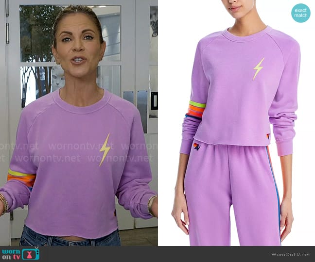 Aviator Nation Lightning Bolt Logo Sweatshirt in Neon Purple Rainbow worn by Natalie Morales on The Talk