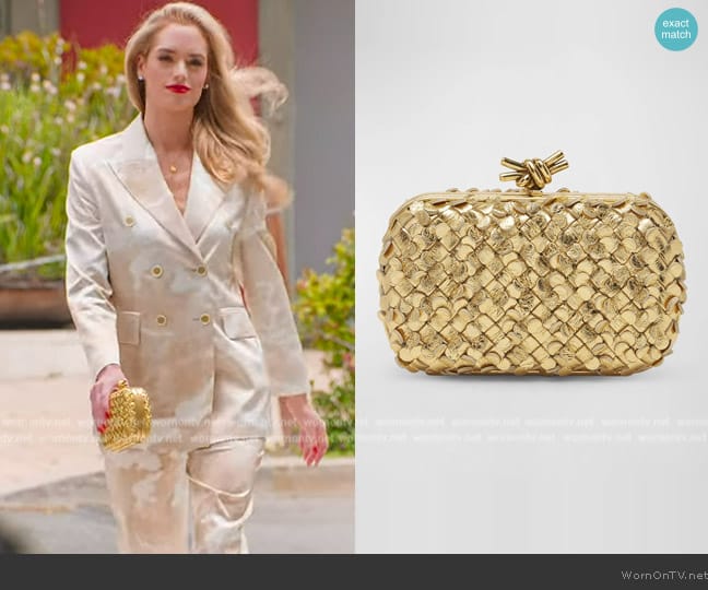 Bottega Veneta Metallic Knot Clutch worn by Alexandra Jarvis (Alexandra Jarvis) on Selling the OC