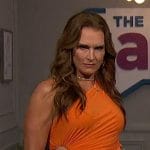 Brooke Shields' orange one-shoulder pleated dress on The Talk