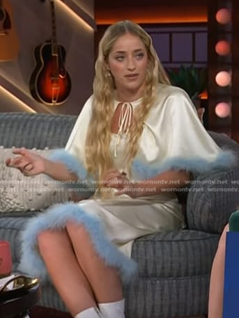 Brynn Cartelli’s white feather trim cape and dress on The Kelly Clarkson Show