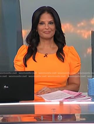 Darlene's orange puff sleeve dress on Today