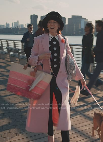 Elsbeth’s pink coat and polka dot print top on Elsbeth