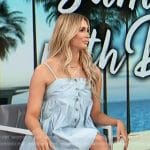 Isabel Alysa’s blue button front mini dress on Access Hollywood