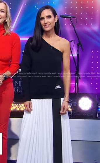 Jennifer Connelly's black one-shoulder top and white pleated skirt on Good Morning America