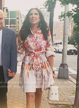 Jenn's floral print dress and white bag on The Real Housewives of New Jersey