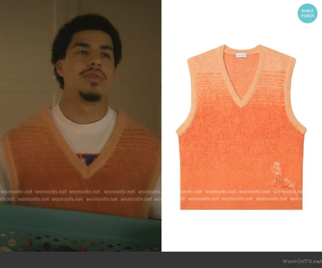 Andre’s orange knit vest on Grown-ish