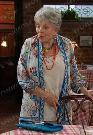 Julie's white floral duster jacket on Days of our Lives