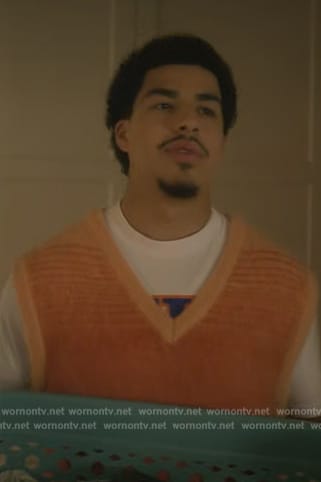 Andre’s orange knit vest on Grown-ish