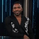 Justin’s black embroidered cardigan on E! News