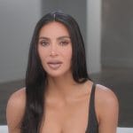 Kim's black confessional dress on The Kardashians