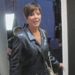 Kris’s black sequin double breasted coat on The Kardashians