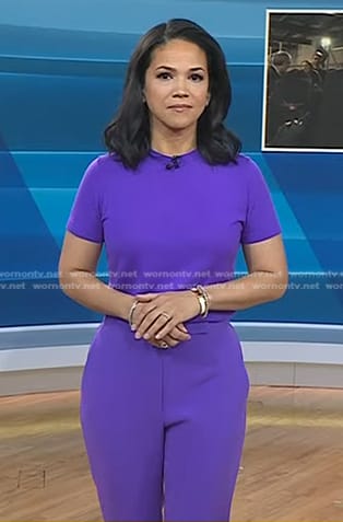 Laura's purple short sleeve sweater and pants on Today