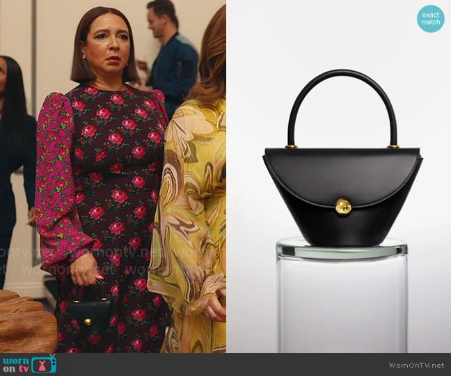 MAM Black Flap Bag worn by Molly Novak (Maya Rudolph) on Loot