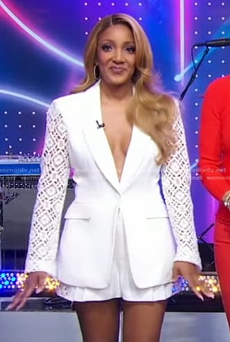 Mickey Guyton’s white crochet sleeve blazer and shorts on Good Morning America