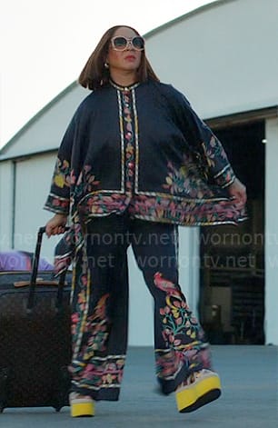 Molly's black printed pants and tunic on Loot