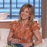 Natalie's orange floral top and turn up jeans on The Talk