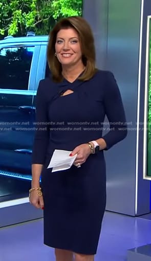 Norah's navy knotted neck dress on CBS Evening News