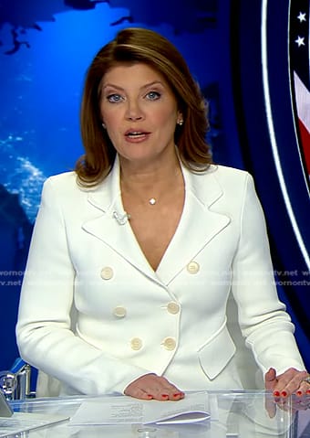 Norah’s white double breasted knit blazer on CBS Evening News