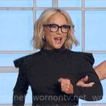 Rachael Harris’ black puff-sleeve top and silver skirt on The Talk