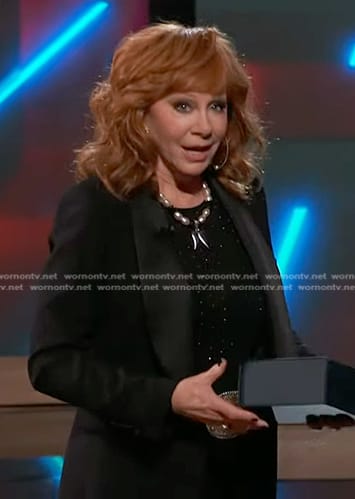 Reba's black satin shawl collar blazer on The Voice