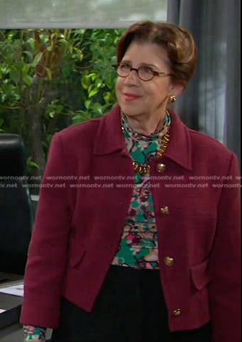 Rita’s green floral top and red jacket on Days of our Lives