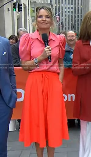 Savannah’s orange satin blouse and midi skirt on Today