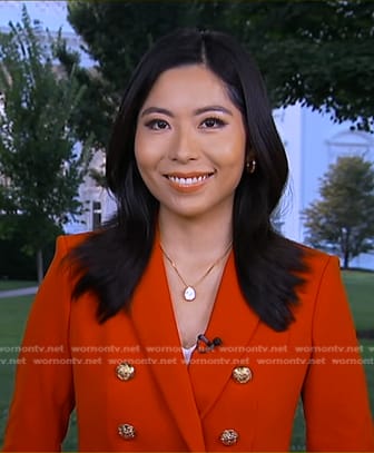 Selina Wang’s red blazer with gold buttons on Good Morning America