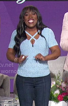 Sheryl's blue knit criss cross top on The Talk