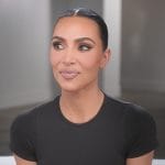 Kim's black confessional tee on The Kardashians