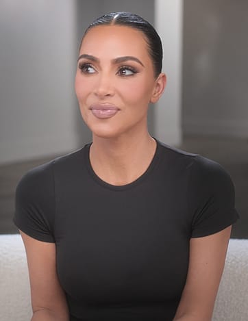 Kim's black confessional tee on The Kardashians