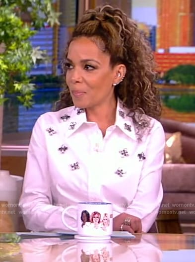 Sunny's white embellished blouse and ruffle skirt on The View