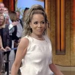 Sunny”s white ruffle top and skirt on Live with Kelly and Mark