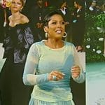 Tamron's blue mesh printed top and pleated skirt on Tamron Hall Show