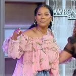 Tamron’s pink floral off shoulder top on Tamron Hall Show