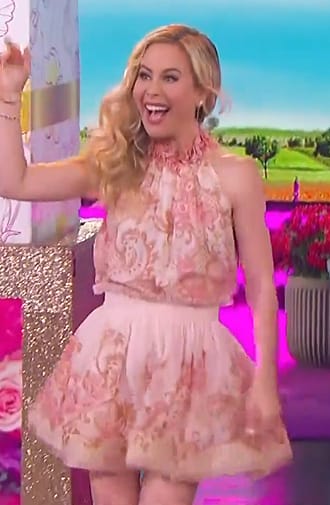 Tara Lipinski's pink mini skirt and top on The Jennifer Hudson Show